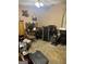 Functional bedroom setup, complete with a desk, storage, and personal fitness area at 420 Dot Dr, South Fulton, GA 30349