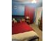 Cozy main bedroom with a comfortable bed, simple decor, and natural lighting at 420 Dot Dr, South Fulton, GA 30349