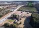 Expansive aerial view of the property highlighting its location near Hwy 155 and its proximity to commercial areas at 2353 Highway 155 N, Mcdonough, GA 30252