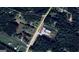 Aerial view of the property showing the land with outlined boundaries for clarity, located off Highway 155 at 2353 Highway 155 N, Mcdonough, GA 30252