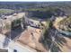 Aerial view of the property showing the land, buildings and the proximity to Highway 155 at 2353 Highway 155 N, Mcdonough, GA 30252