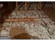 Insulated attic space with wooden beams and floor at 2142 E Atlanta Rd, Stockbridge, GA 30281