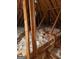 View of attic insulation, wooden beams, and ventilation duct at 2142 E Atlanta Rd, Stockbridge, GA 30281