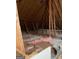Spacious attic featuring ample insulation and wooden support beams at 2142 E Atlanta Rd, Stockbridge, GA 30281