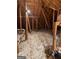 Well-insulated attic space with exposed wooden framing and ceiling light at 2142 E Atlanta Rd, Stockbridge, GA 30281
