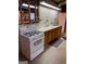 Functional basement kitchen with gas range, and ample cabinet storage at 2142 E Atlanta Rd, Stockbridge, GA 30281