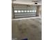 Spacious garage with a large, modern door, offering ample storage and parking at 2142 E Atlanta Rd, Stockbridge, GA 30281