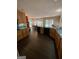 Bright kitchen featuring a breakfast nook, modern appliances, wood cabinets and dark floors at 2142 E Atlanta Rd, Stockbridge, GA 30281