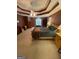 Large main bedroom with a tray ceiling, ceiling fan, and spacious layout at 2142 E Atlanta Rd, Stockbridge, GA 30281