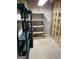Unfinished basement space for storage with shelving units at 2142 E Atlanta Rd, Stockbridge, GA 30281