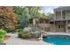 A backyard featuring landscaping, a pool and an outdoor stairway at 1385 Gordon Rd, Moreland, GA 30259