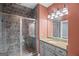 Bathroom showcases a glass-enclosed shower, granite countertop, and modern vanity at 1385 Gordon Rd, Moreland, GA 30259
