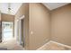 Hallway with stone flooring, neutral wall paint, and access to the pool at 1385 Gordon Rd, Moreland, GA 30259