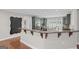 Gourmet kitchen with granite counters, stainless steel appliances and breakfast bar for modern living at 1385 Gordon Rd, Moreland, GA 30259