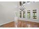Spacious living room with high ceilings, natural light, and hardwood flooring at 1385 Gordon Rd, Moreland, GA 30259