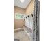 Mudroom with storage bench, cubbies, hooks, and a window, offering functionality and convenience at 1385 Gordon Rd, Moreland, GA 30259