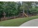 Spacious backyard playground with multiple play structures, perfect for outdoor entertainment at 1385 Gordon Rd, Moreland, GA 30259