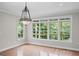 Bright sunroom with floor to ceiling windows providing stunning views of the outdoors at 1385 Gordon Rd, Moreland, GA 30259
