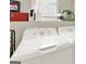 Bright laundry room with side by side washer and dryer units and shelf storage at 340 Cedar St, Social Circle, GA 30025
