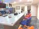 Finished basement bar area with sink, multiple chairs and baseball themed decor at 130 Victoria Pl, Fayetteville, GA 30214