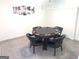 Basement game room featuring poker table and chairs at 130 Victoria Pl, Fayetteville, GA 30214