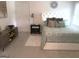 Cozy bedroom with plush carpeting, tufted headboard, and ample natural light at 130 Victoria Pl, Fayetteville, GA 30214