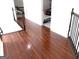 Bright hallway with hardwood floors leading to rooms at 130 Victoria Pl, Fayetteville, GA 30214
