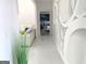 Elegant hallway showcasing white marble floors and a modern accent wall at 130 Victoria Pl, Fayetteville, GA 30214