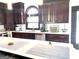 Bright kitchen featuring stainless steel appliances and a large island at 130 Victoria Pl, Fayetteville, GA 30214