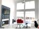 Bright living room features a modern fireplace and plenty of natural light at 130 Victoria Pl, Fayetteville, GA 30214