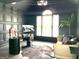 Stylish home office with a modern desk, comfortable seating, and custom wall paneling at 130 Victoria Pl, Fayetteville, GA 30214