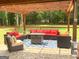 Cozy outdoor living area with fire pit, comfortable seating, and stylish patio at 130 Victoria Pl, Fayetteville, GA 30214