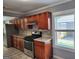 A well-lit kitchen view with stainless steel appliances and sleek gas range at 615 Cofield Dr, Hapeville, GA 30354
