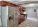 A full kitchen view showcasing stainless steel refrigerator and gas range at 615 Cofield Dr, Hapeville, GA 30354