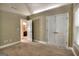 Spacious bedroom with carpet and a glimpse into the bathroom at 2804 Dominion Nw Ln # Bldg 2, Kennesaw, GA 30144