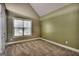 Neutral toned bedroom features carpeted floor and double door closet at 2804 Dominion Nw Ln # Bldg 2, Kennesaw, GA 30144