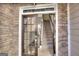 Elegant front door with glass panes and stone exterior, welcoming entrance to the home at 2804 Dominion Nw Ln # Bldg 2, Kennesaw, GA 30144
