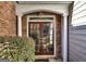 Inviting front entrance with brick and columns surrounding glass doors at 2804 Dominion Nw Ln # Bldg 2, Kennesaw, GA 30144