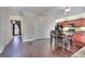 Eat-in kitchen shows updated cabinetry and hardwood floors at 2804 Dominion Nw Ln # Bldg 2, Kennesaw, GA 30144