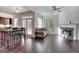 Cozy living area with fireplace, hardwood floors, and eat-in kitchen at 2804 Dominion Nw Ln # Bldg 2, Kennesaw, GA 30144