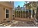 Private patio area with brick pavers and manicured hedges, perfect for outdoor entertaining at 2804 Dominion Nw Ln # Bldg 2, Kennesaw, GA 30144