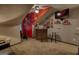 Finished bonus room with sports memorabilia, a TV, and a bar area, offering a relaxed space for recreation at 55 Ashton Pl, Covington, GA 30016