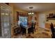 Cozy dining area with ample seating and bright natural light at 55 Ashton Pl, Covington, GA 30016