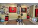 Finished basement game room showcasing two dart boards, team decorations, and a unique design at 55 Ashton Pl, Covington, GA 30016