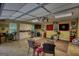 Finished garage featuring a kitchenette, ample lighting, and organized storage, perfect for recreational activities at 55 Ashton Pl, Covington, GA 30016