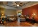 Open-concept living room with hardwood floors and plenty of comfortable seating at 55 Ashton Pl, Covington, GA 30016