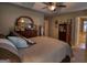 Well-lit main bedroom showcasing a large dresser, and neutral decor, creating a relaxing atmosphere at 55 Ashton Pl, Covington, GA 30016