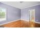 Stylish bedroom with hardwood floors, neutral walls, and natural light at 3451 Fairway Dr, College Park, GA 30337