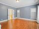 Large bedroom with blue walls and direct access to the bathroom at 3451 Fairway Dr, College Park, GA 30337