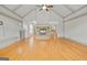 Spacious bonus room showcasing a cozy stone fireplace and open floor plan with great natural light at 3451 Fairway Dr, College Park, GA 30337